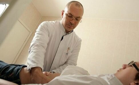doctor examining a patient with prostatitis